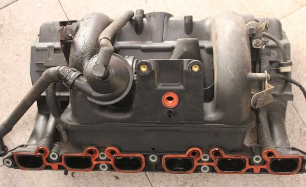 Exhaust smell and a burnt-out engine in a BMW - what is the cause and how to fix it?